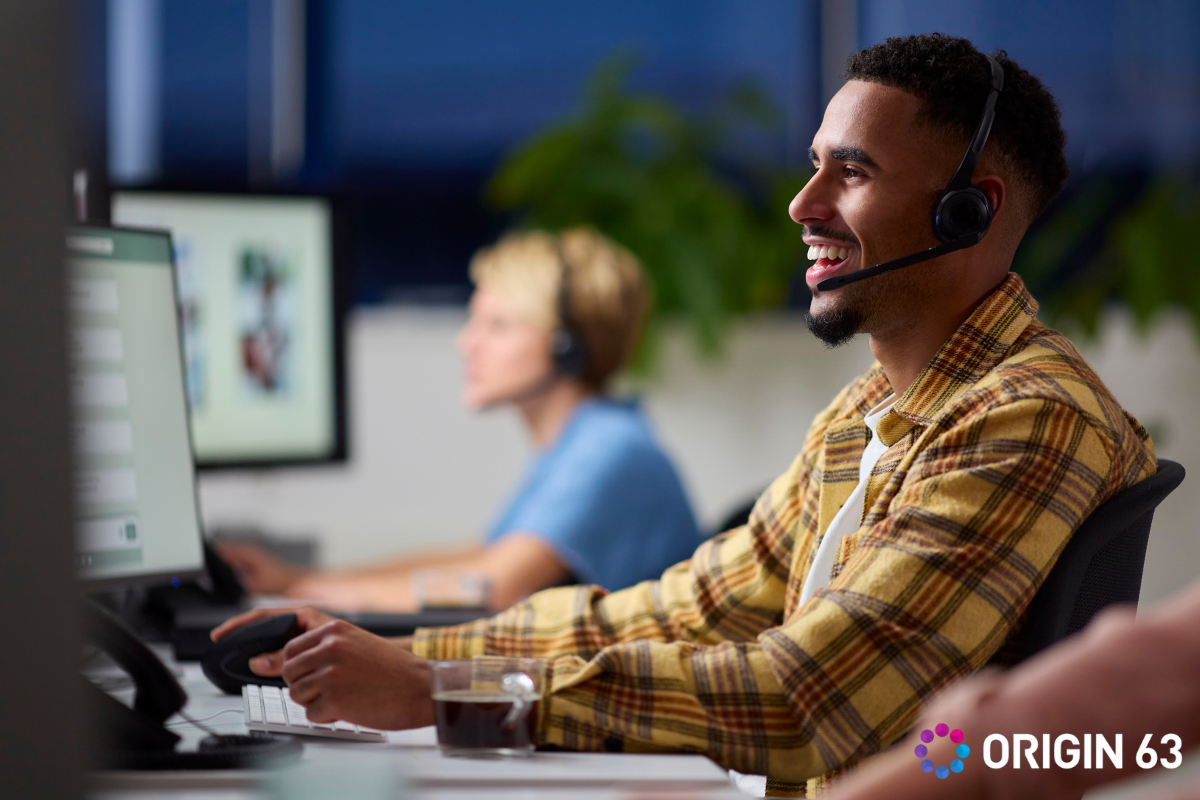 Customer service rep working on the computer, What Is HubSpot AI?