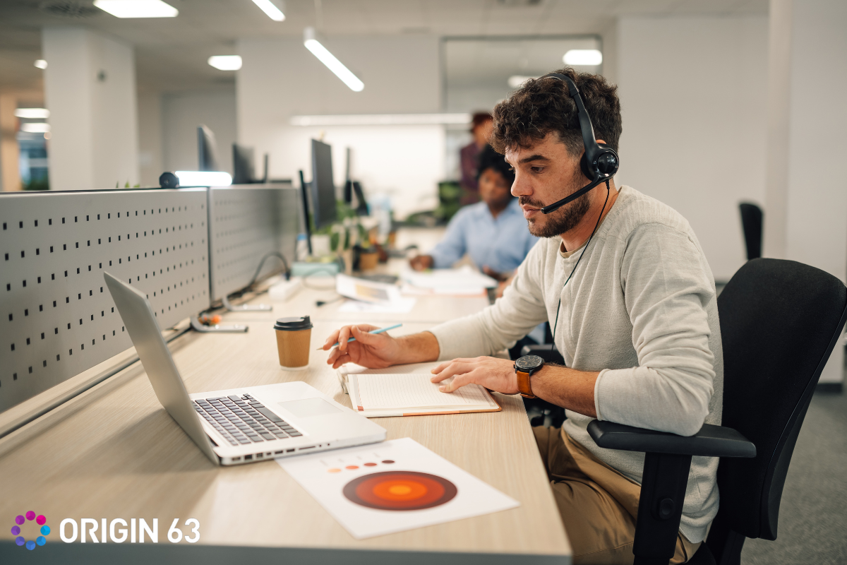Customer success representative working in the office, Health Scores with Feedback Loops