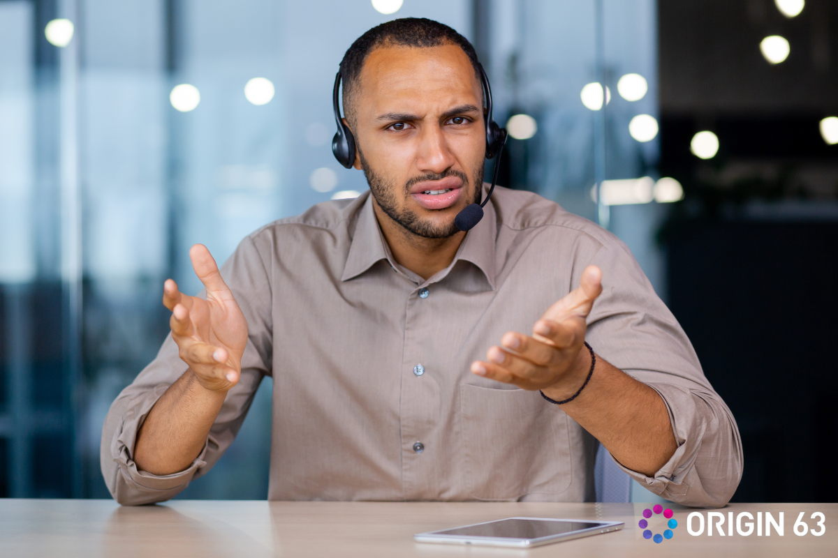 Customer Service Representative working at the office, How Does HubSpot Health Scores Help Reduce Churn? 