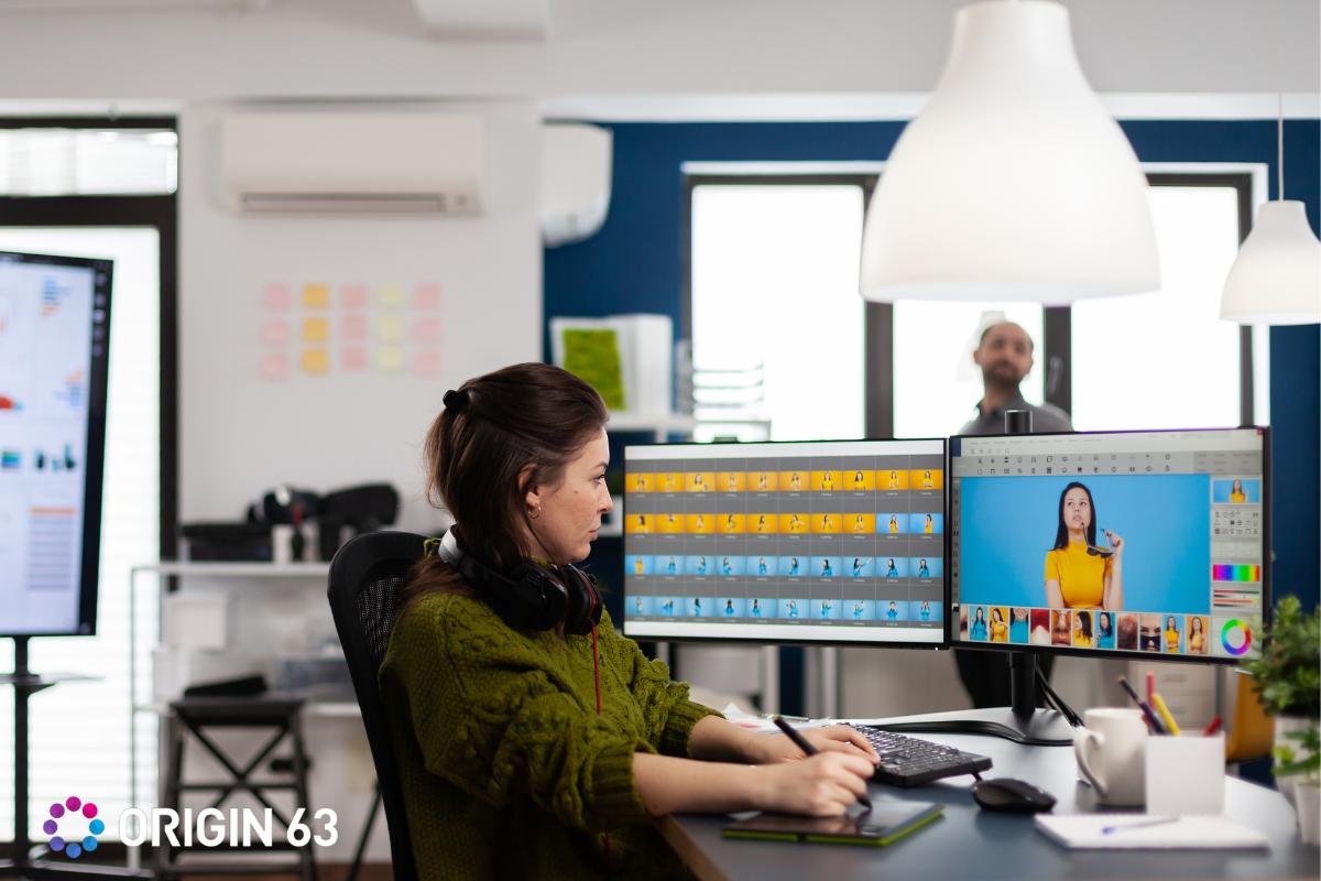  Marketer working in the office, How to Repurpose Content with Content Remix