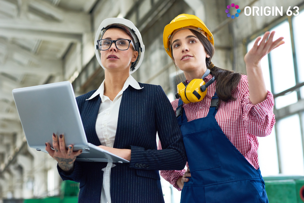 two-person-manufacturing-staffs-having-a-conversation