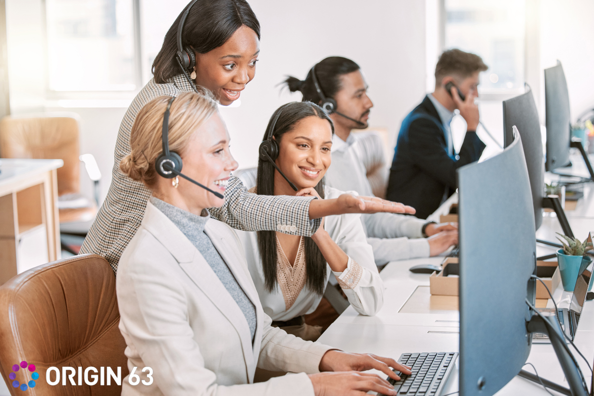 Customer service leader coaching their team