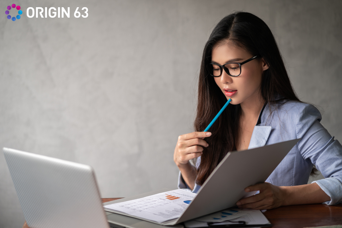 woman-analyzing-data-in-office