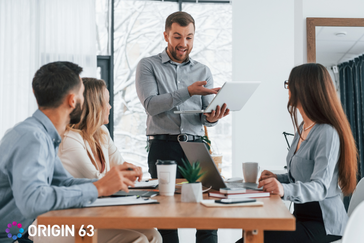 A manufacturing business leader is training the team for CRM adoption